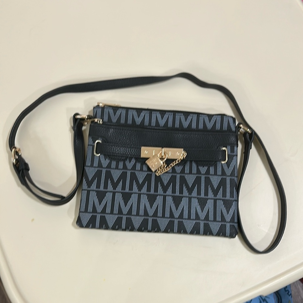 MKF crossbody 2 pocket purse.